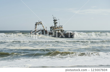 View of abandoned old drowned ship in the sea of Africa 123007604