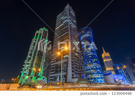 Doha city business downtown center illuminated at night, with modern skyscrapers, Qatar Doha city business downtown center illuminated at night, with modern skyscrapers, Qatar 123008496