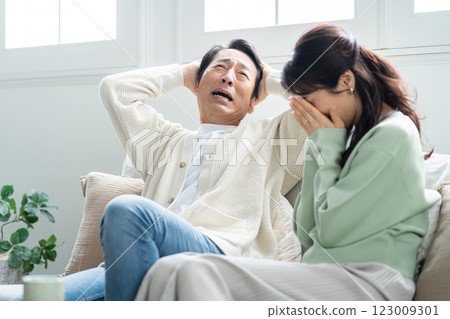 A desperate couple in their 50s A desperate couple in their 50s 123009301