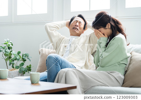 A desperate couple in their 50s 123009303