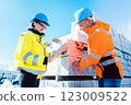 logistics worker with construction material to be transported 123009522