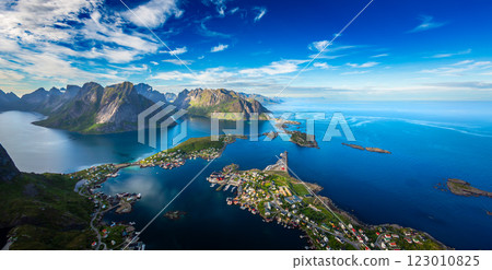 Amazing landscape of the Lofoten Islands from the top of Reinebringen Mountain with blue sky , county of Nordland, Norway. Amazing landscape of the Lofoten Islands from the top of Reinebringen Mountain with blue sky , county of Nordland, Norway. 123010825