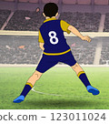 A soccer player wearing a navy and yellow uniform with the number 8 is captured mid-action on the field. A soccer player wearing a navy and yellow uniform with the number 8 is captured mid-action on the field. 123011024