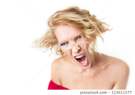 Closeup portrait of angry shouting woman isolated at white background. Concept of stress, agressive behavior and relationship conflict. 123011577