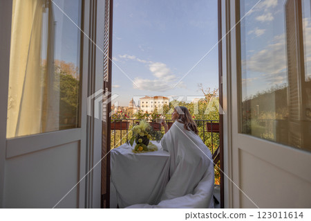 Elegant Morning on a Roman Balcony 123011614