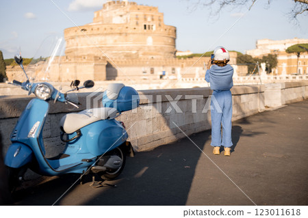 Tourist Capturing Castel Sant'Angelo in Rome 123011618