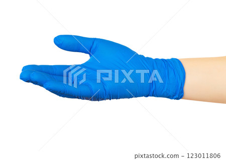 Gesture give help concept. Female doctor hand in blue medical glove isolated at white background. Covid-19 protection. Gesture give help concept. Female doctor hand in blue medical glove isolated at white background. Covid-19 protection. 123011806