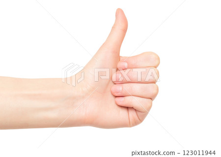 Closeup left female hand with thumb up gesturing success isolated at white background. 123011944