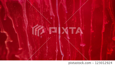 Ink wet effect. Blur paint drip. Defocused red color shine liquid drops water cloud vapor texture wave on abstract art background. Ink wet effect. Blur paint drip. Defocused red color shine liquid drops water cloud vapor texture wave on abstract art background. 123012924