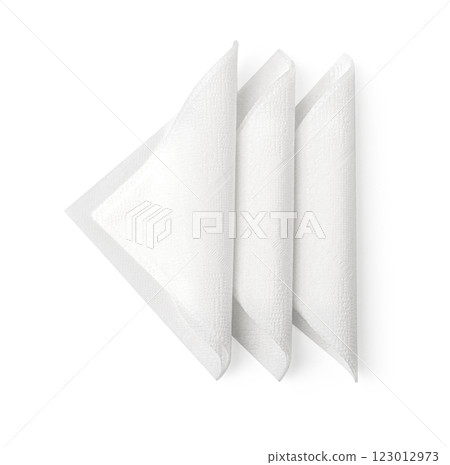 Three white folded paper napkins isolated on white background Three white folded paper napkins isolated on white background 123012973