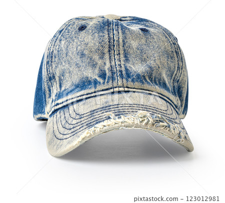 Light blue denim baseball cap with frayed brim on white background 123012981