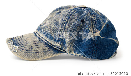 Light blue denim baseball cap with frayed brim on white background 123013010