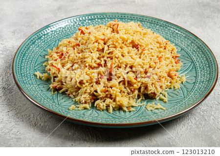 basmati rice with saffron, on a decorative blue plate, light background, homemade, no people, 123013210