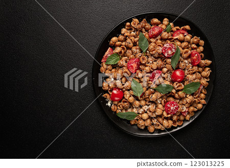 Tuscan pasta with smoked paprika and basil,parmesan cheese, Italian traditional cuisine, Tuscan pasta with smoked paprika and basil,parmesan cheese, Italian traditional cuisine, 123013225