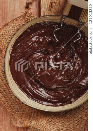 a bowl of chocolate dough , a whisk for a mixer, baking, structure and consistency, homemade, top view, no people, a bowl of chocolate dough , a whisk for a mixer, baking, structure and consistency, homemade, top view, no people, 123013230