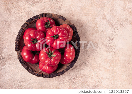Pink tomatoes, in a rustic wooden bowl, close-up, no people, Pink tomatoes, in a rustic wooden bowl, close-up, no people, 123013267