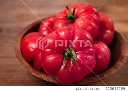 Pink tomatoes, in a rustic wooden bowl, close-up, no people, 123013269