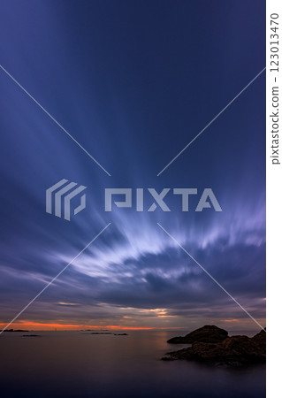 Light art spreading across the sky, dramatic twilight at Morito Beach Light art spreading across the sky, dramatic twilight at Morito Beach 123013470