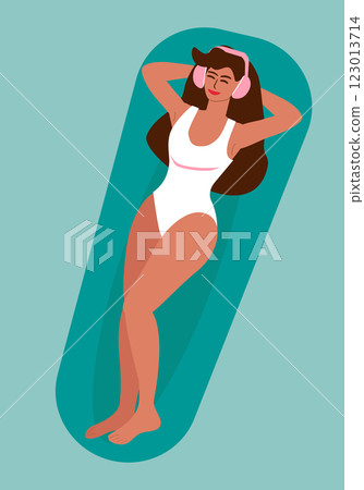 Young tanned woman in swimsuit listening to music in pool Young tanned woman in swimsuit listening to music in pool 123013714