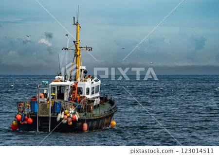 Commercial Fishing Trawler On The Calm Water Of The Atlantic Ocean In Scotland, UK 123014511
