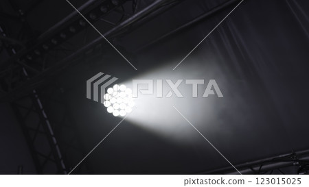 A Spotlight That Powerfully Illuminates the Stage, Creating a Stunning Dramatic Effect and Impact. Clip A Spotlight That Powerfully Illuminates the Stage, Creating a Stunning Dramatic Effect and Impact. Clip 123015025