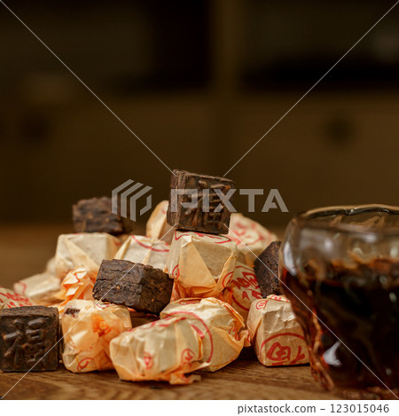Enjoy delightful traditional candies paired with a refreshing and invigorating drink 123015046