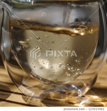 Enjoy a Refreshing Glass of Sparkling Beverage That Energizes and Uplifts Your Spirits Enjoy a Refreshing Glass of Sparkling Beverage That Energizes and Uplifts Your Spirits 123015062