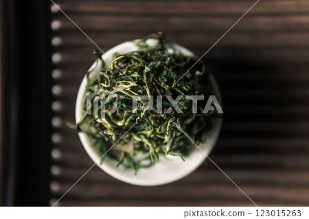 Enjoy Premium Green Tea Leaves in a Beautiful Bowl Natural, Aromatic, and Refreshing Enjoy Premium Green Tea Leaves in a Beautiful Bowl Natural, Aromatic, and Refreshing 123015263