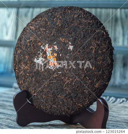 A Beautiful HighQuality Compressed Raw Tea Cake is Now Displayed for Your Enjoyment 123015264