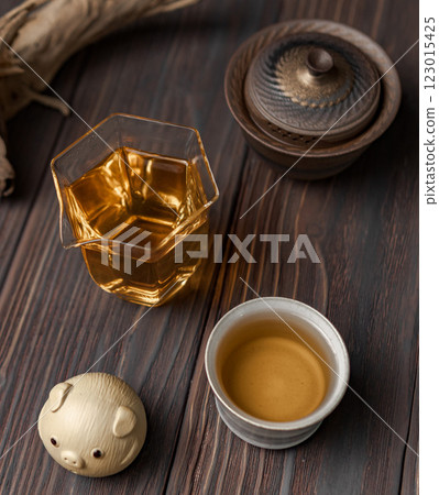 Enjoy a Cozy Tea Setup with Unique Accessories and Elegant Glassware for enhanced enjoyment Enjoy a Cozy Tea Setup with Unique Accessories and Elegant Glassware for enhanced enjoyment 123015425