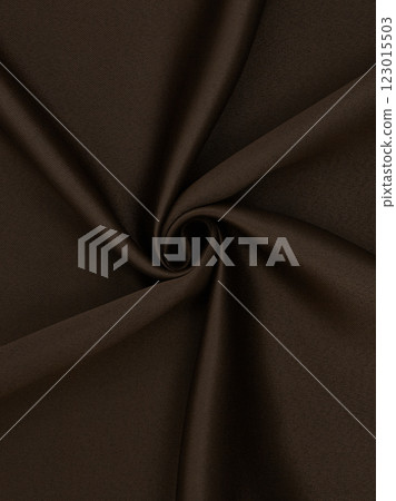 Close-up of twisted brown curtain fabric texture in smooth folds 123015503