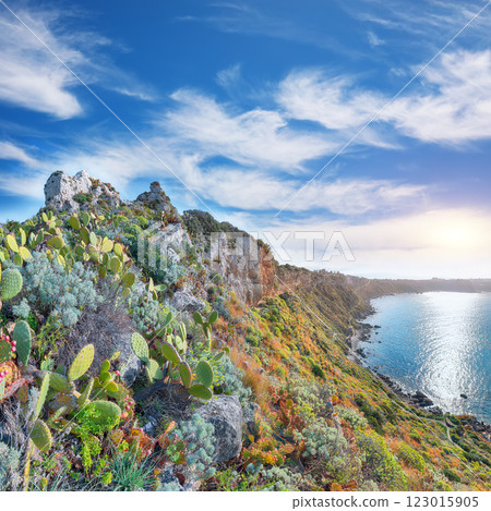Picturesque spring view on the the cape Milazzo panorama of nature reserve Piscina di Venere. 123015905