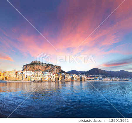 Fantastic evening cityscape of Cefalu city. Popular travel destination of Mediterranean sea. 123015921