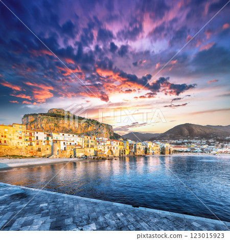 Fantastic evening cityscape of Cefalu city. Popular travel destination of Mediterranean sea. 123015923
