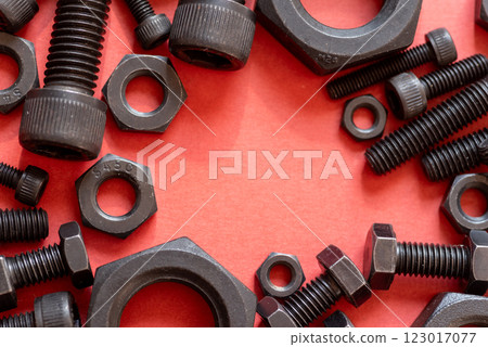 Nuts on a red background Nuts on a red background 123017077