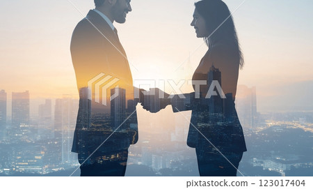 Double exposure of a romantic couple and a city skyline at sunset Double exposure of a romantic couple and a city skyline at sunset 123017404