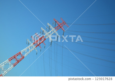 Clear skies and high voltage lines 123017628