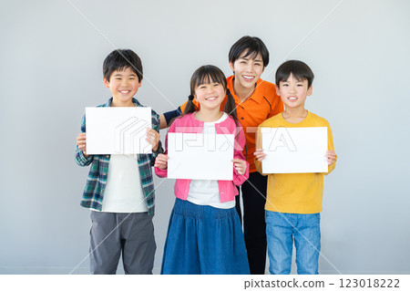 Elementary school students taking lessons in a classroom 123018222