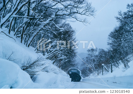 Snow shelter Driving on a snowy national highway c-2 Cool colors Snow shelter Driving on a snowy national highway c-2 Cool colors 123018540