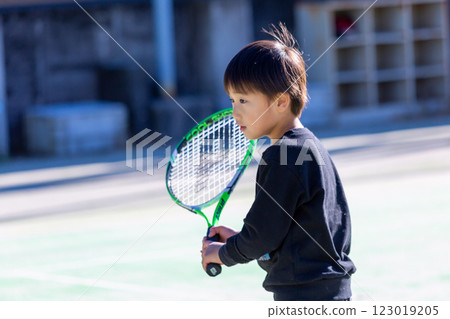 Boy playing tennis, toddler 123019205