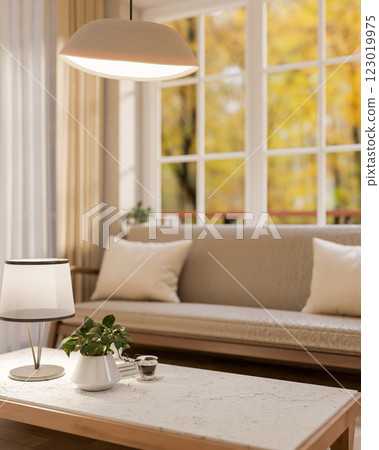 A minimalist coffee table, set in a contemporary living room with an autumn view through the window. 123019975