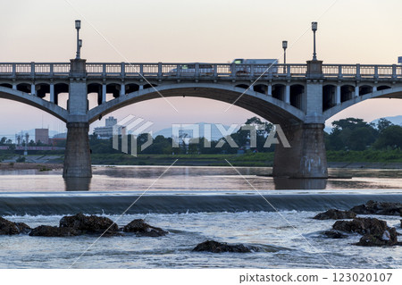 Mukogawa River and arch bridge in the early morning 123020107