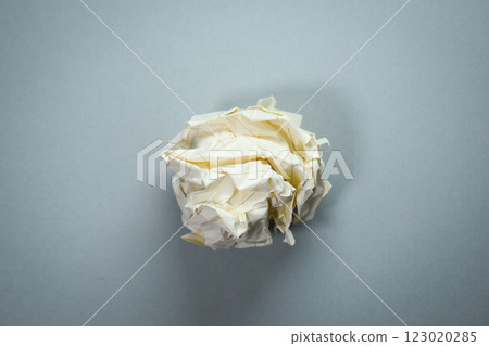 round lump paper on grey background, recycle used paper round lump paper on grey background, recycle used paper 123020285