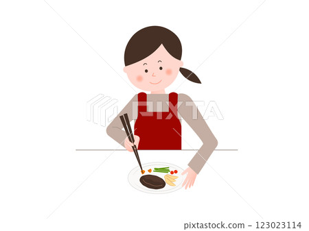 一名婦女正在做飯(擺盤) 一名婦女正在做飯(擺盤) 123023114