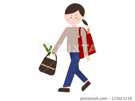 A woman holding a shopping bag A woman holding a shopping bag 123023118