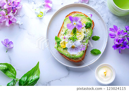 Avocado toast topped with edible flowers, a vibrant and creative gourmet brunch concept Avocado toast topped with edible flowers, a vibrant and creative gourmet brunch concept 123024115