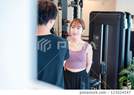 Gym trainer and student Gym trainer and student 123024547