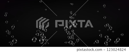 Fizzy water bubbles floating on dark background. 123024824