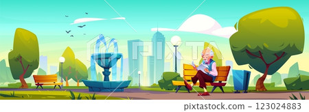 Elderly man reads newspaper in public urban park 123024883