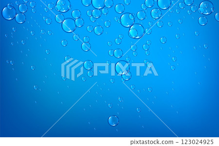 Fizzy bubbles rise in blue water. 123024925